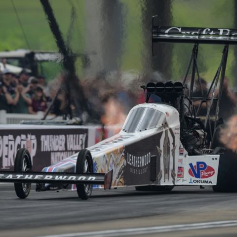 Tony Schumacher flexed his muscle with round wins over Jasmine Salinas, Shawn Langdon, top qualifier Clay Millican and final round opponent Doug Kalitta to score his 87th career victory in the NHRA Mission Foods Drag Racing Series.