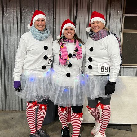 Family and friends enjoy the Speedway In Lights 5K presented by Fleet Feet each winter at Bristol Motor Speedway. More than 1,000 festively dressed participants are expected to compete in the tradition-rich event.