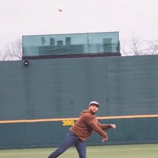 Wallace launches his ceremonial first pitch from atop the mound at Lindsey Nelson Stadium on March 5 prior to the Tennessee-Xavier game.