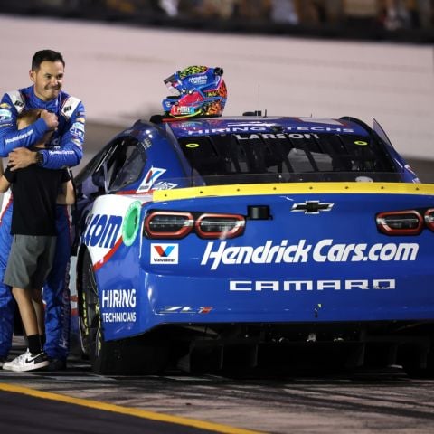 Kyle Larson and his son Owen have an embrace near the start-finish line after Larson won the Bass Pro Shops Night Race Saturday night at Bristol Motor Speedway.