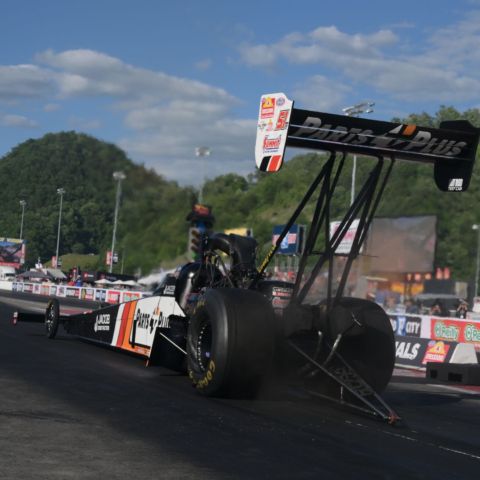 Tennessee native Clay Millican powered to the qualifying lead in Top Fuel Friday in his Rick Ware Racing-owned dragster at Bristol Dragway to lead the Super Grip NHRA Thunder Valley Nationals.