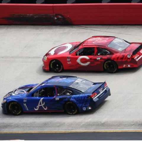 Chase Elliott drove the Atlanta Braves-themed Chevy and Ross Chastain piloted the Cincinnati Reds-themed Chevy during the press conference for the Speedway Classic.