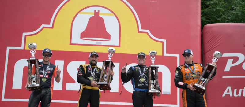 New event sponsor Super Grip presented each of the four Mission Foods winners at Bristol Dragway Sunday with custom trophies for winning the Super Grip NHRA Thunder Valley Nationals. Winners, from left to right, included Gaige Herrera, Tony Schumacher, Austin Prock and Jeg Coughlin Jr.
